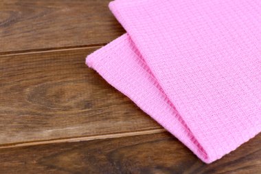 Kitchen towels on wooden background