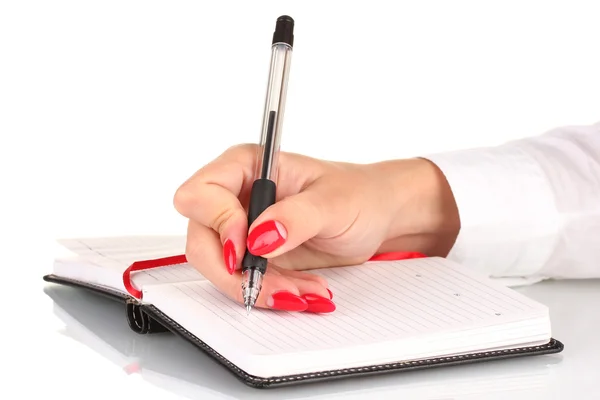 Hand signing in notebook isolated on white — Stock Photo, Image