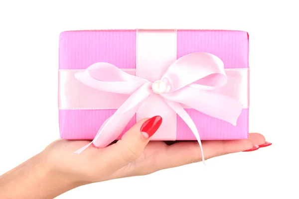 Woman holds box with gift on white background close-up — Stock Photo, Image