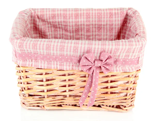 Wicket cesta com tecido rosa e arco, isolado em branco — Fotografia de Stock