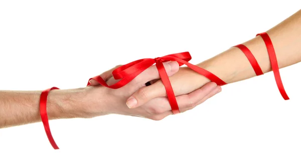 Mans and girls hands tied with ribbon isolated on white — Stock Photo, Image