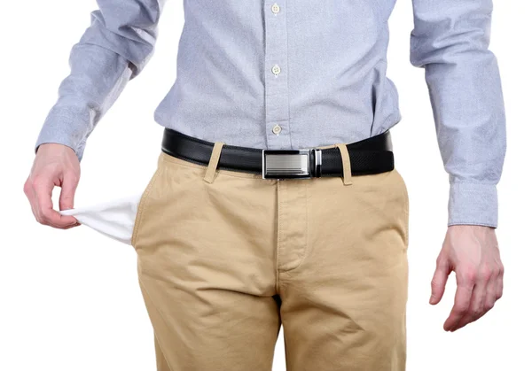 Uomo che mostra la sua tasca vuota isolata sul bianco — Foto Stock