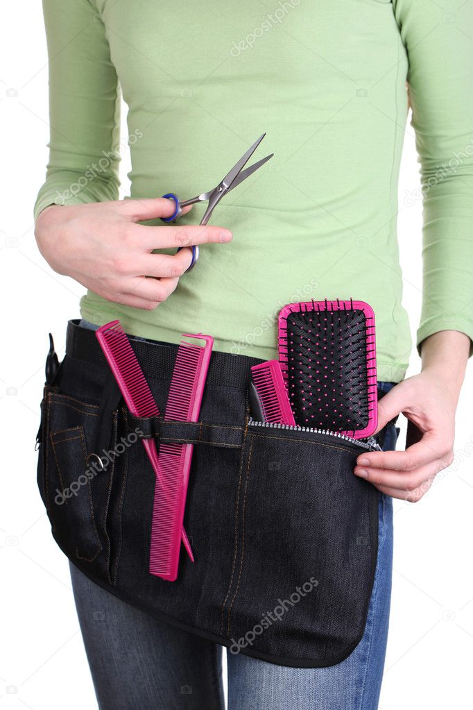 Woman hairdresser with tool belt isolated on white