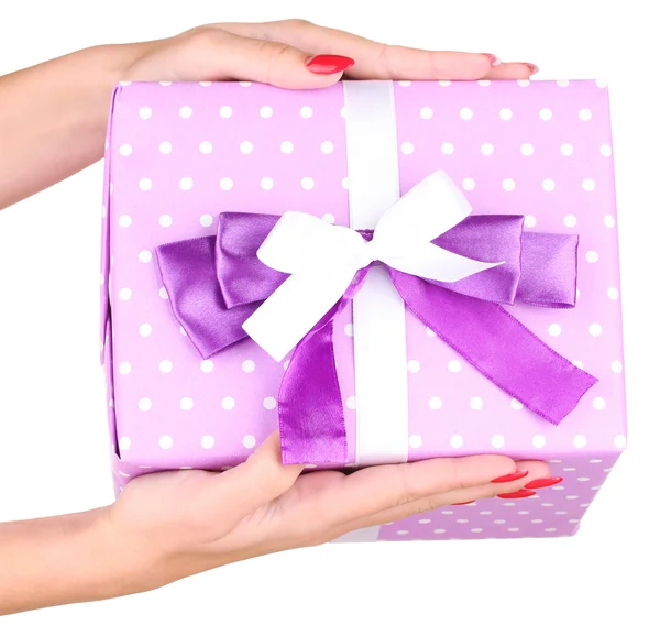 Woman holds box with gift on white background close-up — Stockfoto