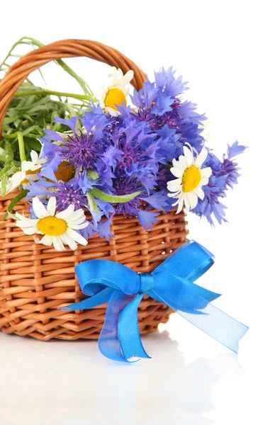 Beautiful bouquet of cornflowers and chamomiles in basket, isolated on white — Stock Photo, Image