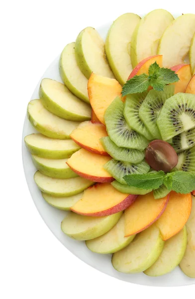 Assortment of sliced fruits on plate, isolated on white — Stock Photo, Image