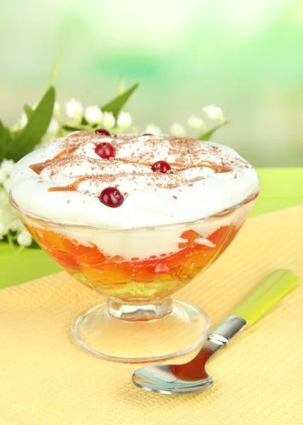 Tasty jelly in bowl on table on light background — Stock Photo, Image