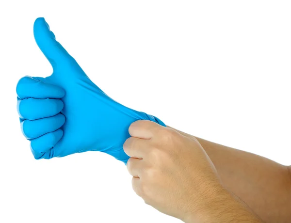 Médico poniéndose guantes protectores, aislado en blanco — Foto de Stock