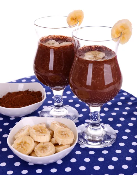 Cocktails with banana and chocolate on table on white background — Stock Photo, Image