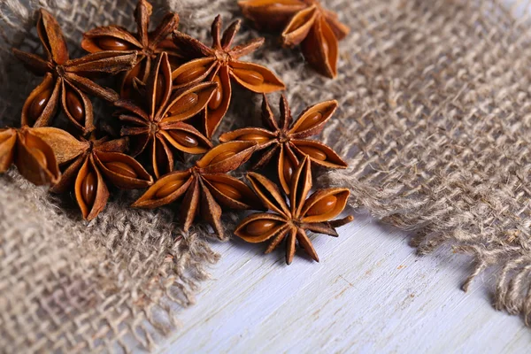 Star anise on wooden background — Stock Photo, Image