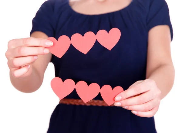 Hands holding paper hearts isolated on white — Stock Photo, Image