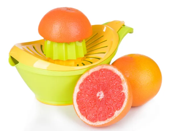 Citrus press and grapefruits isolated on white — Stock Photo, Image