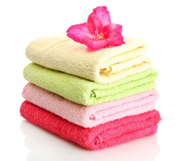 Bright towels and flower isolated on white — Stock Photo, Image