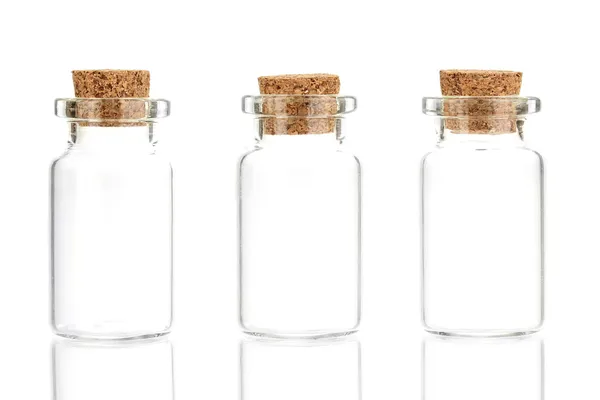 Empty little bottles with cork stopper isolated on white — Stock Photo, Image