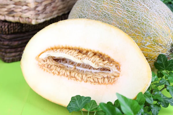 Ripe melons on wooden table close-up — Stock Photo, Image