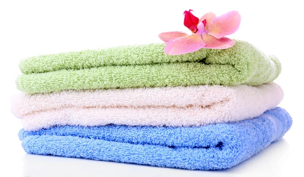 Orchid flower and towels, isolated on white — Stock Photo, Image