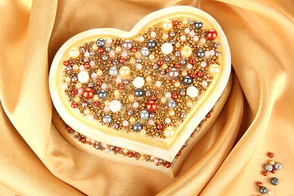 Beautiful hand made casket, on silk background — Stock Photo, Image