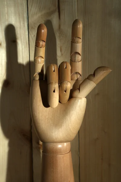 Wooden hand on wooden background — Stock Photo, Image