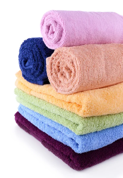 Colorful towels isolated on white Royalty Free Stock Photos