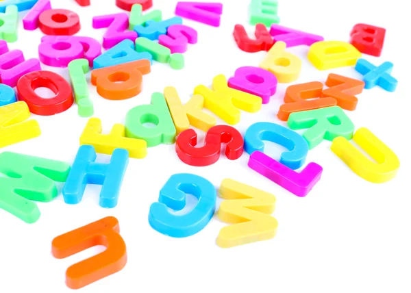Kleurrijke magnetische brieven geïsoleerd op wit — Stockfoto