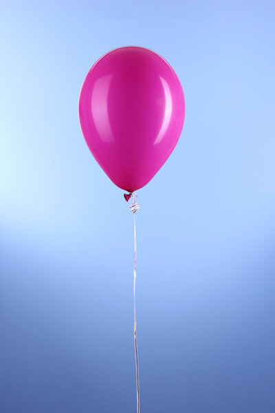 Purple one balloon on blue background