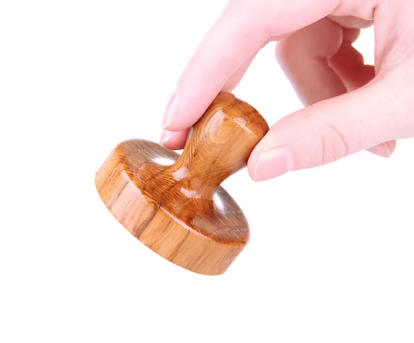 Hand with wooden stamp, isolated on white — Stock Photo, Image