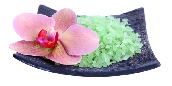 Still life with beautiful blooming orchid flower and heap of sea salt, isolated on white — Stock Photo, Image