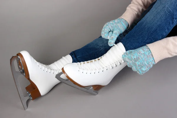 Skater wearing skates on gray background — Stock Photo, Image