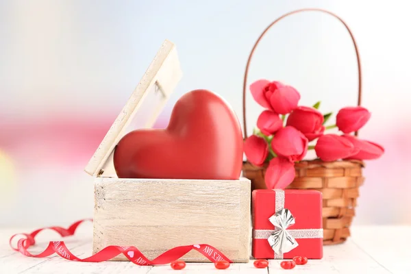 Romantic still life with heart in wooden casket — Stock Photo, Image