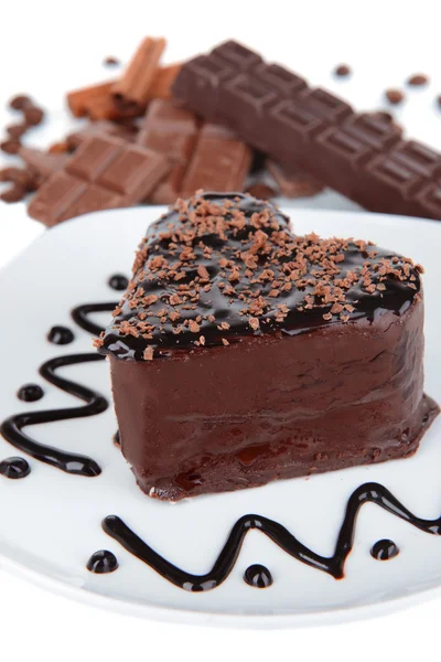 Süße Torte mit Schokolade auf Teller in Großaufnahme — Stockfoto