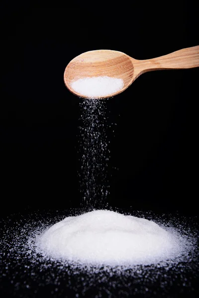 Açúcar isolado em preto — Fotografia de Stock