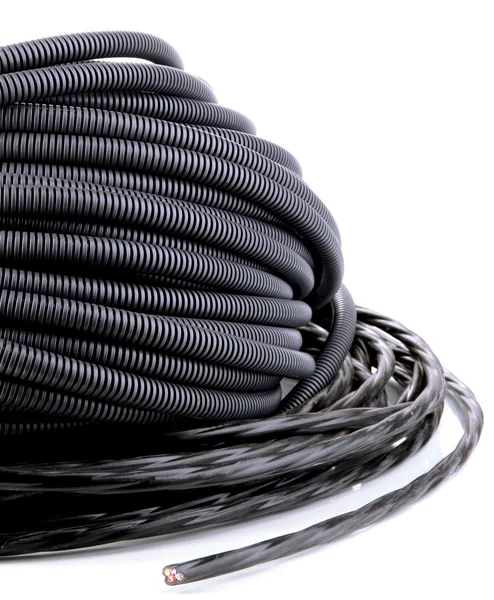 Black cables close-up isolated on white — Stock Photo, Image