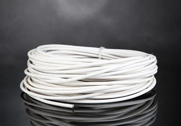 White cable on grey background — Stock Photo, Image