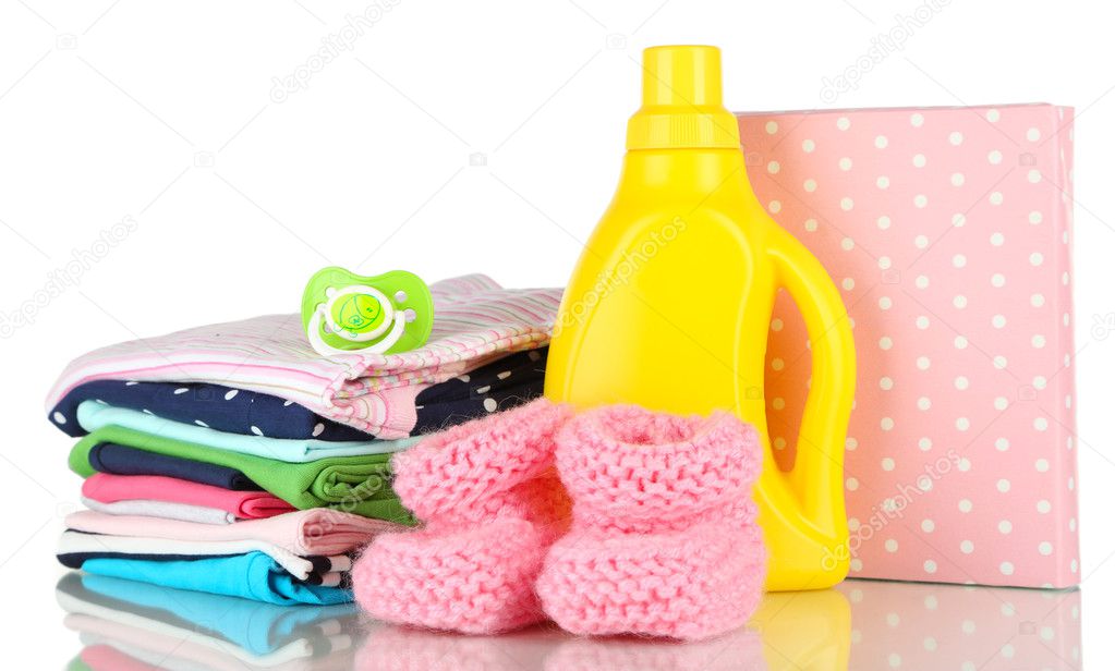 Softener dryer and washing powder with children clothes isolated on white