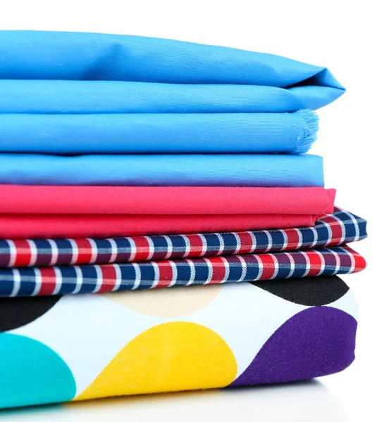 Montón de telas de colores aislados en blanco — Foto de Stock