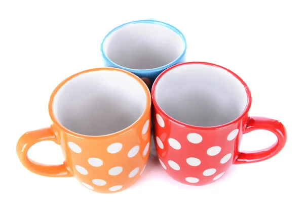 Color polka dot mugs isolated on white — Stock Photo, Image