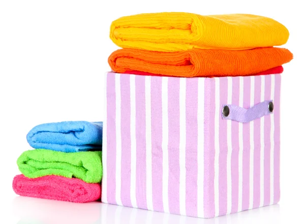 Textile box with bright towels, isolated on white — Stock Photo, Image