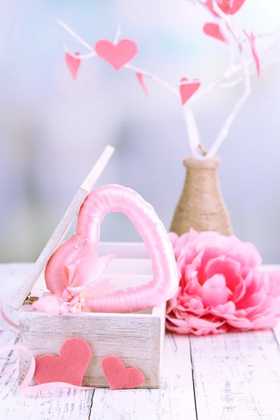 Romantic still life with heart in wooden casket — Stock Photo, Image