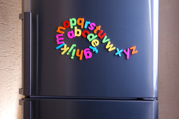 Colorful magnetic letters on refrigerator