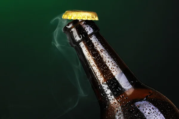 Top of open wet beer bottle on dark background — Stock Photo, Image