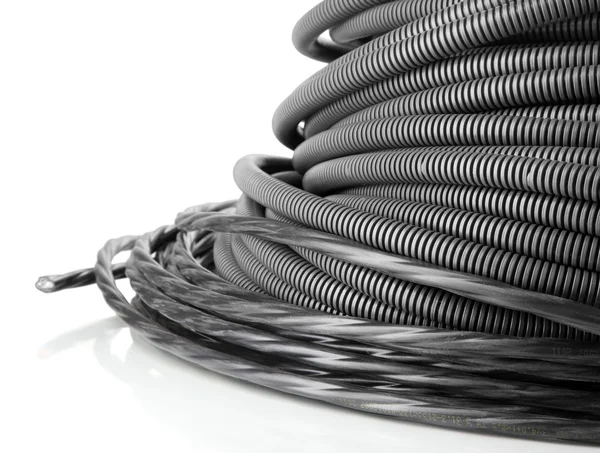 Black cables close-up isolated on white — Stock Photo, Image