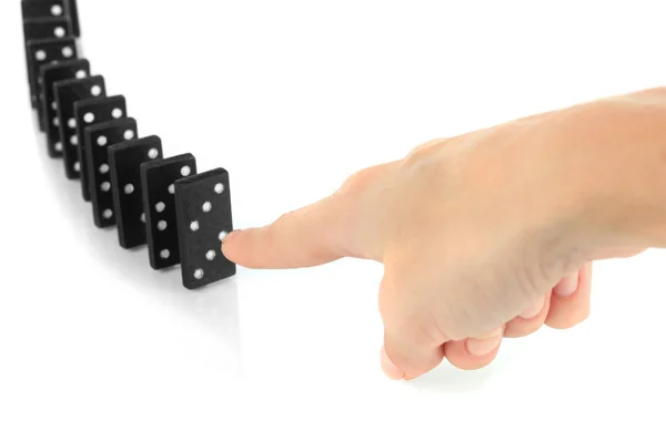 Mano spingendo domino isolato su bianco — Foto Stock