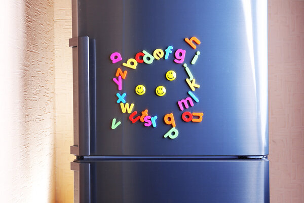 Colorful magnetic letters on refrigerator