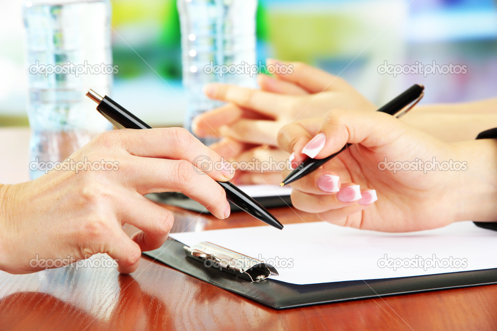 Close up of business people hands during teamwork