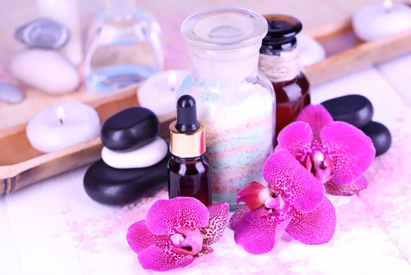 Beautiful spa setting with orchid on white wooden table close-up — Stock Photo, Image