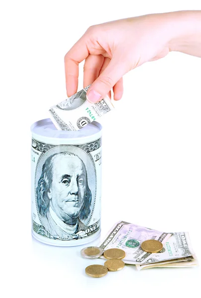 Kvinnlig hand att lägga pengar i Sparbössa isolerad på vit — Stockfoto