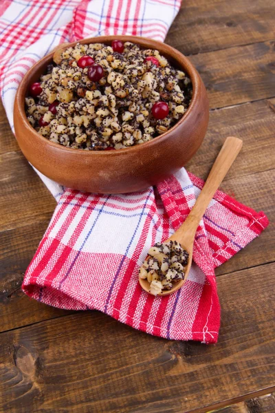 Plate with kutia - traditional Christmas sweet meal in Ukraine, Belarus and Poland, on wooden background — Stock Photo, Image