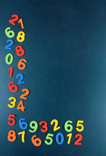 Colorful numbers on school desk background — Stock Photo, Image