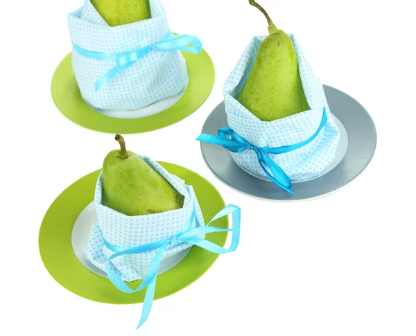 Pears in napkins on plates isolated on white — Stock Photo, Image