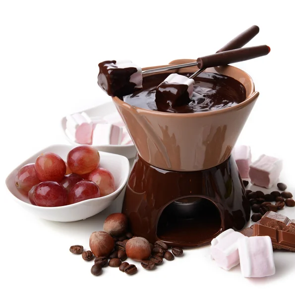 Chocolate fondue with marshmallow candies and fruits, isolated on white — Stock Photo, Image